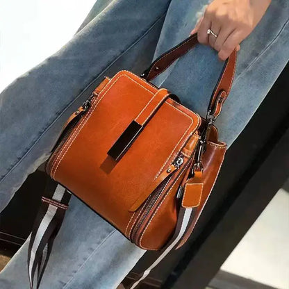 Elegante bolso bandolera de piel auténtica