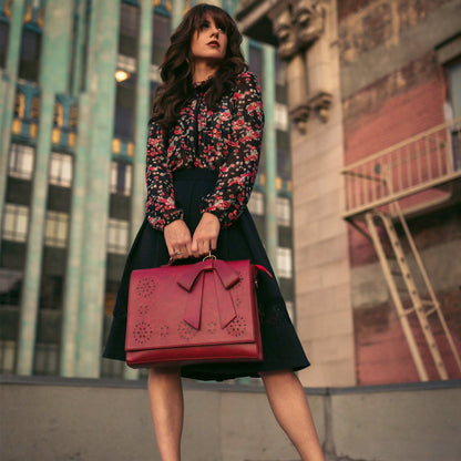 Elegante bolso satchel con pajarita de Grace